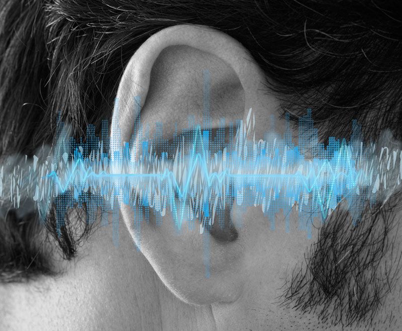tinnitus-management-treatment An ear with a diagram of sound waves placed over it to emulate tinnitus management