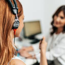 Woman participates in hearing test