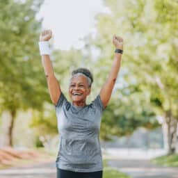 Senior woman running happy