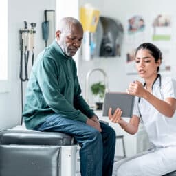 Doctor talking to her patient.