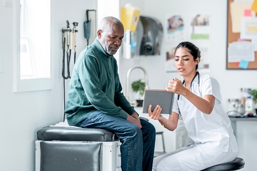 Doctor talking to her patient.